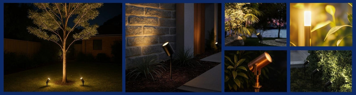 Black and bronze cylindrical garden spike lights illuminating stone walls and garden foliage at night