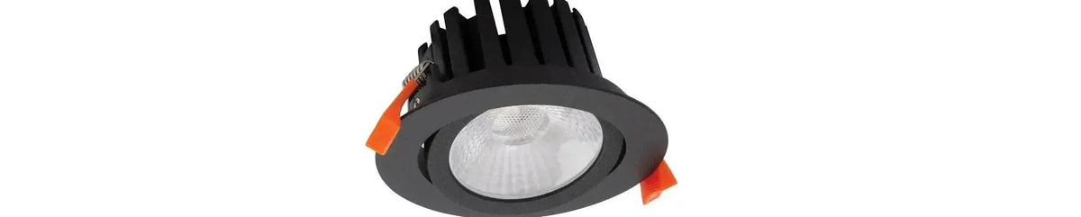 Round black recessed Gimble downlight with a textured heat sink and orange spring clips on a white background